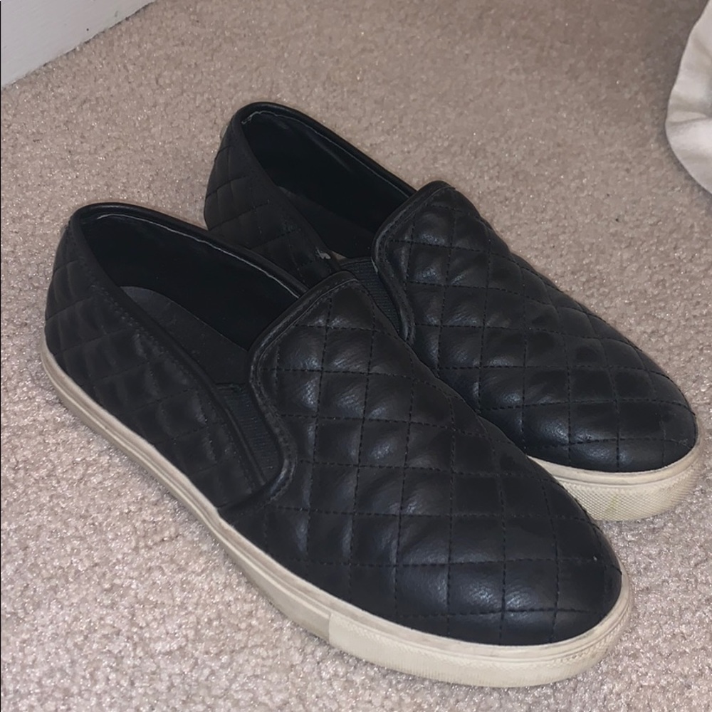 Black Steve Madden slip ons